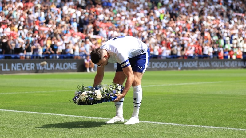 Ben Whiteman of Preston North End lays a floral wreath ahead of kick-off