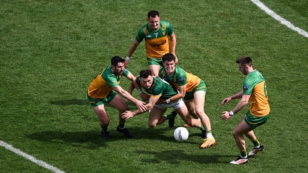 13 July 2025; Jordan Morris of Meath in action against Donegal players, left to right, Ryan McHugh, Caolan McColgan, Finnbarr Roarty, and Eoghan Bán Gallagher during the GAA Football All-Ireland Senior Championship semi-final match between Meath and Donegal at Croke Park in Dublin. Photo by Daire Br