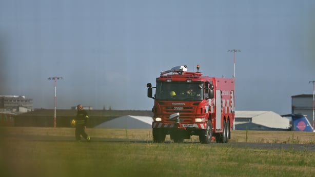 Emergency services attend the scene of a plane crash at Southend Airport on July 13, 2025 in Southend, England. A Beechcraft B200 passenger plane has crashed shortly after take off from London Southend Airport. The aircraft, which was scheduled to fly to Lelystad in the Netherlands, was reportedly s