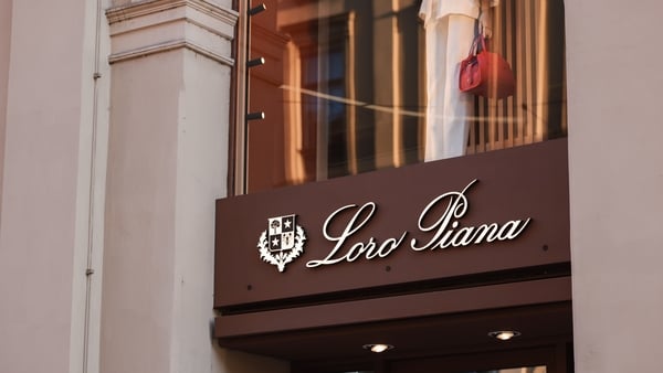 A Loro Piana logo on a store building