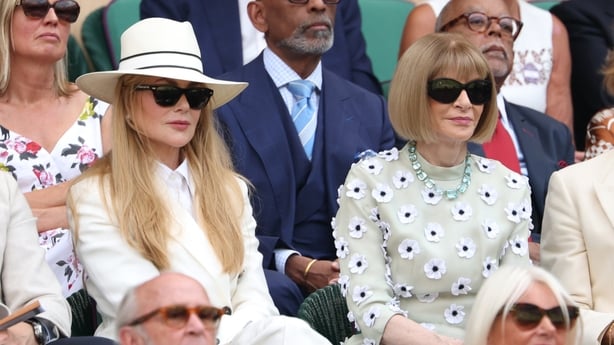 LONDON, ENGLAND - JULY 13: Former cyclist Sir Chris Hoy, Actress Nicole Kidman and former Editor-in-Chief of Vogue Magazine Anna Wintour look on in the Royal Box during the Ladies' Doubles Final match between Veronika Kudermetova and Elise Mertens of Belgium against Jelena Ostapenko of Latvia and Su