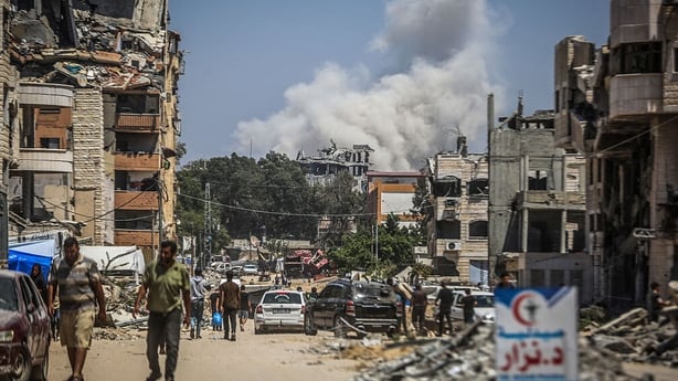 Smoke rises after an Israeli airstrike causing panic at the area in Gaza City