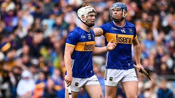 6 July 2025; Darragh McCarthy of Tipperary, left, is consoled by team-mate Jason Forde as he leaves the pitch after he was sent off by referee James Owens during the GAA Hurling All-Ireland Senior Championship semi-final match between Kilkenny and Tipperary at Croke Park in Dublin. Photo by Piaras Ó