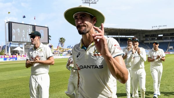 Mitchell Starc (2L) of Australia walks off the field waving to supporters during the third day of the third Test cricket match between West Indies and Australia at Sabina Park in Kingston, Jamaica, on July 14, 2025. (Photo by Randy Brooks / AFP)