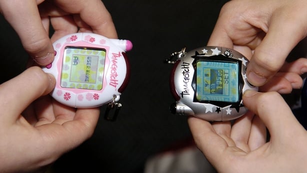 Children playing with the Tamagotchi toy