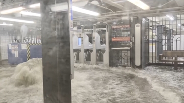 Floodwater gushes into New York subway station amid heavy rainfall