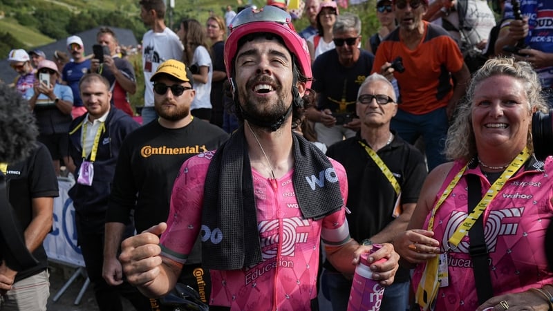 Ben Healy celebrates becoming the fourth Irish rider to wear the yellow jersey