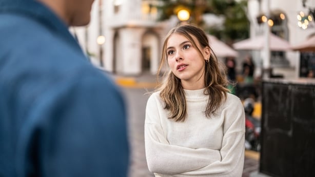 Young couple having an argument outdoors