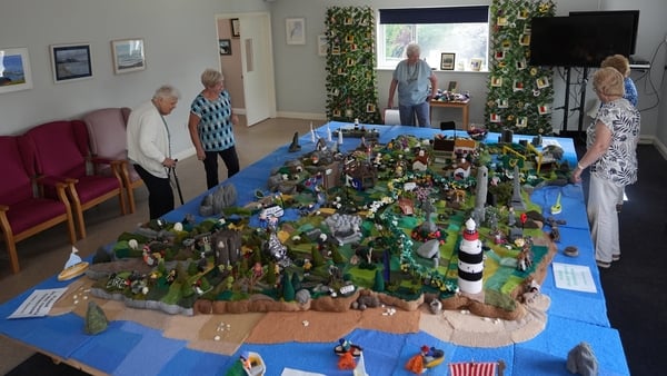 Some of the knitters in Carnew Community Care centre in Carnew Co. Wicklow, with their knitted Map of Ireland