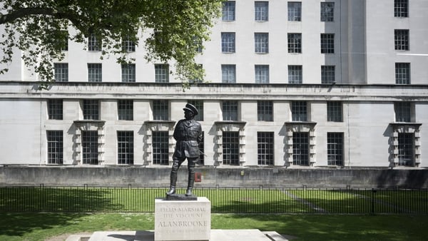 a statue of a person in a military uniform