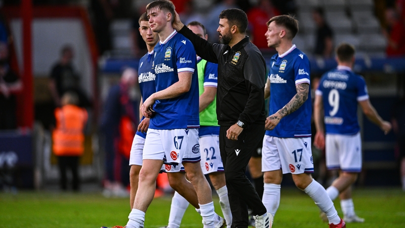 Linfield manager David Healy consoles Matthew Orr after the first leg