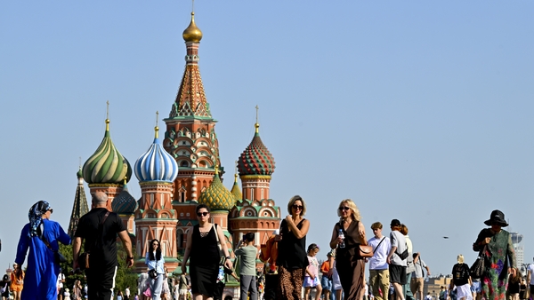 MOSCOW, RUSSIA - JULY 11: People flock to areas with ornamental fountains and cooling stations in and around the historic Red Square with temperatures rising above 35 degrees Celsius in Moscow, Russia, on July 11, 2025. (Photo by Sefa Karacan/Anadolu via