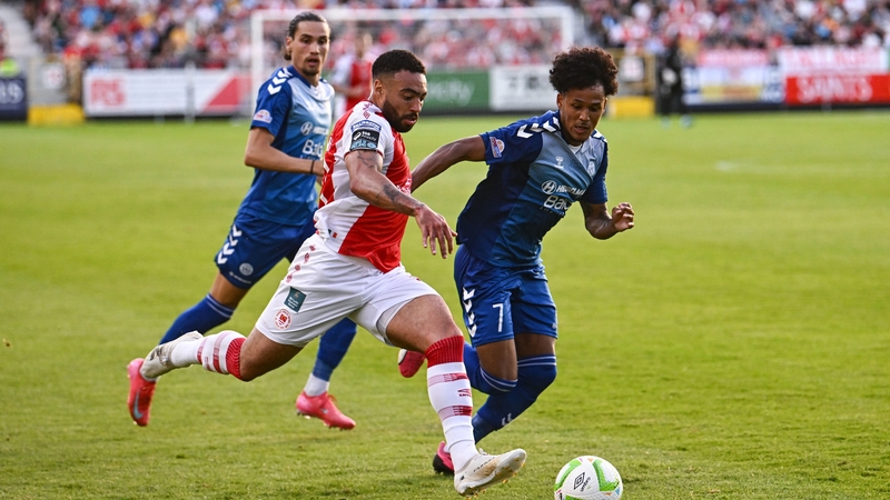 Jake Mulraney takes on the Hegelmann defence during the UEFA Conference League first round qualifier at Richmond Park