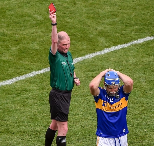 28 July 2019; Referee Sean Cleere shows John McGrath of Tipperary a red card during the GAA Hurling All-Ireland Senior Championship Semi Final match between Wexford and Tipperary at Croke Park in Dublin. Photo by Daire Brennan/Sportsfile