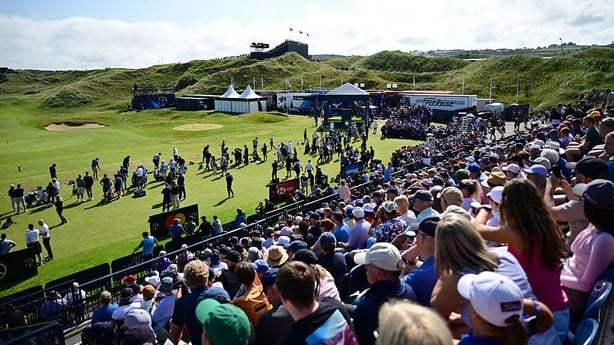 Spectators look across the driving range prior to The 153rd Open Championship at Royal Portrush Golf Club