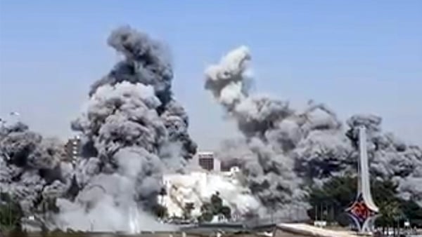 DAMASCUS, SYRIA - JULY 16: Smoke rises from the Syrian army's General Staff Complex after Israeli warplanes carried out multiple airstrikes in Damascus, Syria on July 16, 2025. The building was targeted three times throughout the day, with visible flames