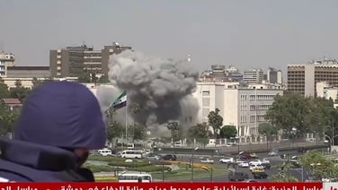 Moment strikes hit Syria as reporter live on air