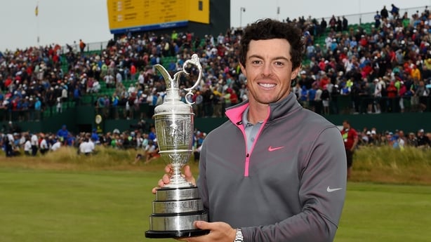 Rory McIlroy of Northern Ireland celebrates with the Claret Jug after his two-stroke victory after the final round of The 143rd Open Championship at Royal Liverpool on July 20, 2014 in Hoylake, England.