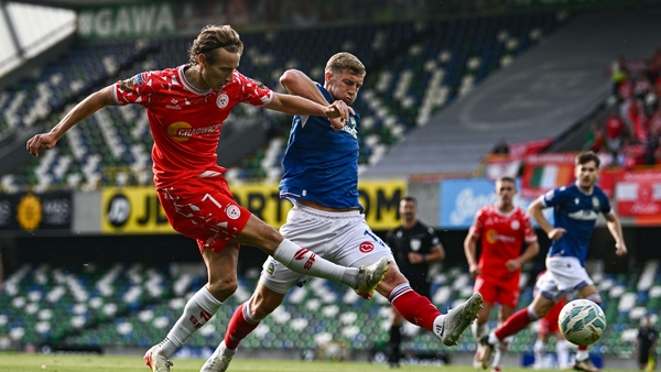 16 July 2025; Harry Wood of Shelbourne in action against Ben Hall of Linfield during the UEFA Champions League First Qualifying Round second leg match between Linfield and Shelbourne at Clearer Twist National Football Stadium at Windsor Park in Belfast. P