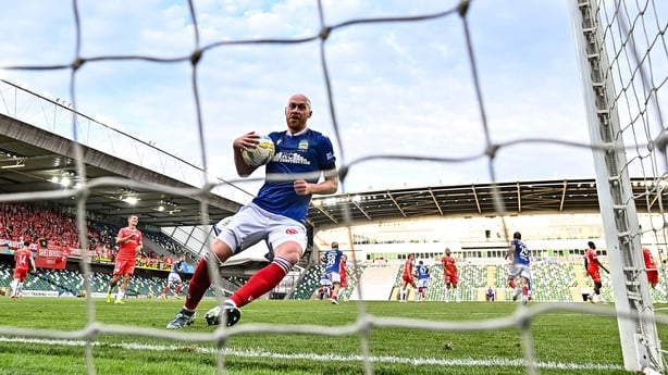 16 July 2025; Chris Shields of Linfield celebrates after scoring his side's first goal, a penalty, during the UEFA Champions League First Qualifying Round second leg match between Linfield and Shelbourne at Clearer Twist National Football Stadium at Windsor Park in Belfast. Photo by Stephen McCarthy