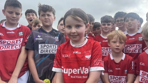 Amy Bohane is pictured with a young group of Cork supporters ahead of the hurling final