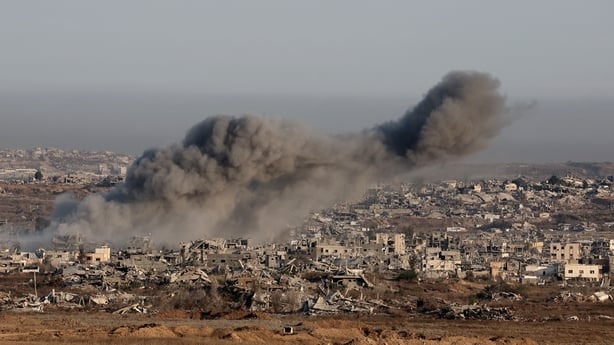 This picture taken from a position on Israel's border with Gaza shows smoke billowing during an Israeli strike on the territory on July 17, 2025
