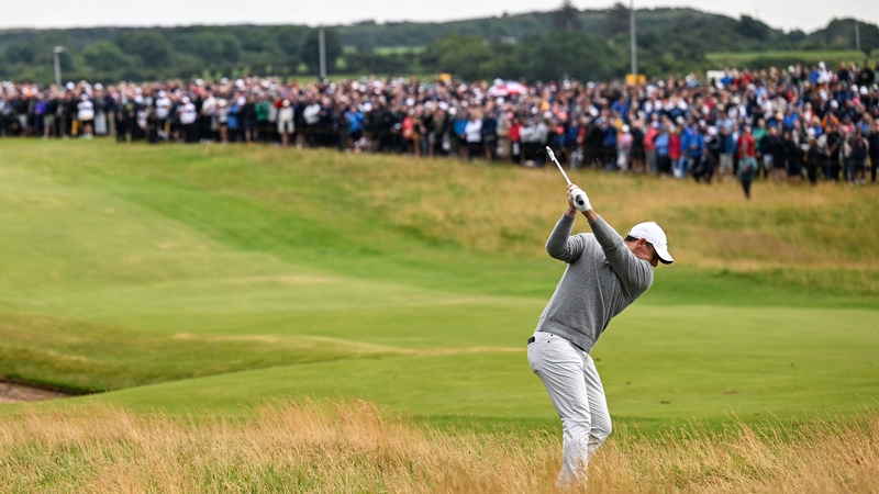 Rory McIlroy plays a shot from the rough on the first hole during day one of The 153rd Open Championship at Royal Portrush Golf Club