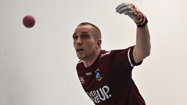 Robbie McCarthy hits a handball