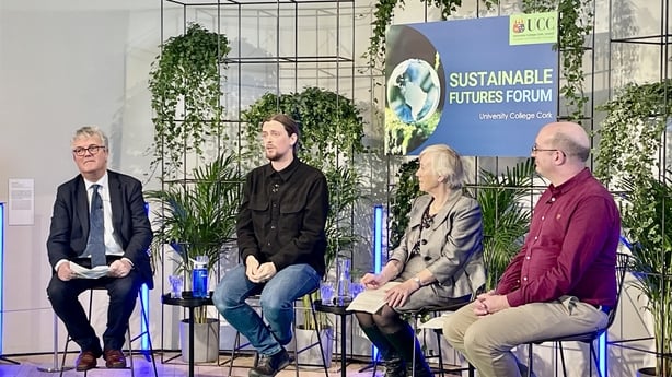 a group of people sitting in chairs at Sustainable Future Forum 2025