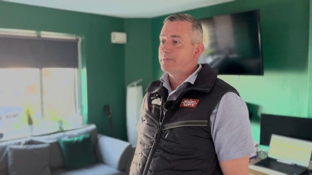 a person in a vest