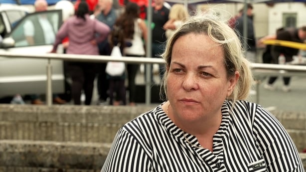 a person in a striped shirt