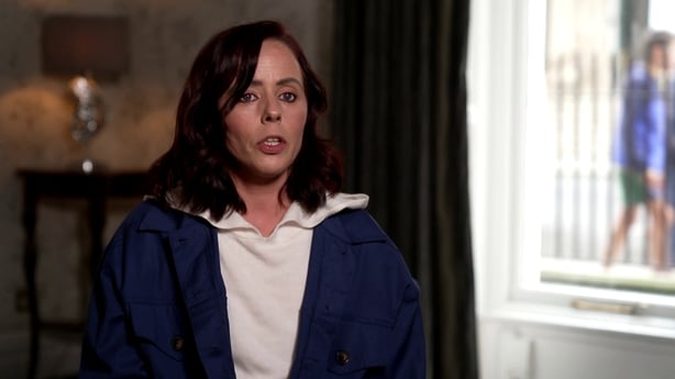 a person in a blue jacket