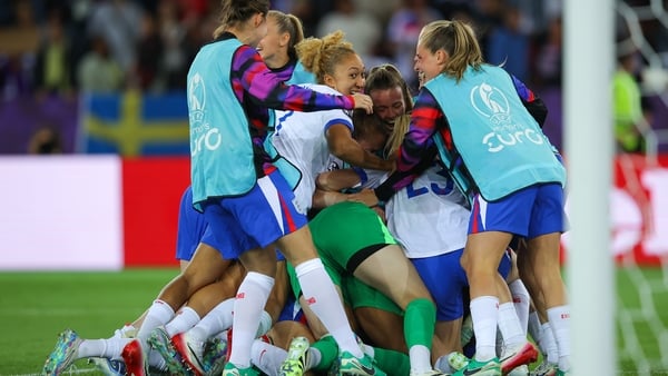 ZURICH, SWITZERLAND - JULY 17: Hannah Hampton of England is mobbed by teammates after the penalty shootout during the UEFA Womens EURO 2025 Quarter-Final match between Sweden and England at Stadion Letzigrund on July 17, 2025 in Zurich, Switzerland. (Phot