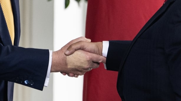 Donald Trump shakes hands with Bahrain's Crown Prince Salman bin Hamad al-Khalifa