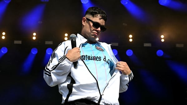 Moglai Bap of Irish rap band Kneecap performs at the West Holts stage on the fourth day of the Glastonbury festival at Worthy Farm in the village of Pilton in Somerset, south-west England, on June 28, 2025.