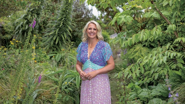 Jacqui Hurley wearing a colourful dress