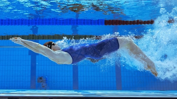 Northern Ireland's Danielle Hill competes in the women's 100m backstroke swimming semi-final at the Sandwell Aquatics Centre, on day two of the Commonwealth Games in Birmingham, central England, on July 30, 2022. (Photo by Oli SCARFF / AFP) (Photo by OLI SCARFF/AFP via Getty Images)