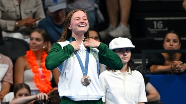 aris , France - 29 July 2024; Women's 100m breaststroke final bronze medallist Mona McSharry of Team Ireland during the award ceremony at the Paris La Défense Arena during the 2024 Paris Summer Olympic Games in Paris, France. (Photo By Stephen McCarthy/Sportsfile via Getty Images)