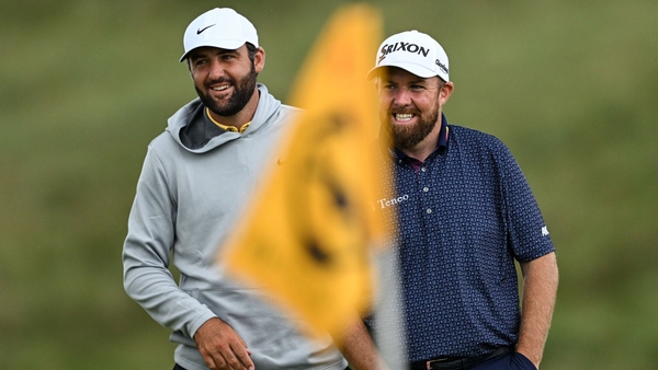 Antrim , United Kingdom - 18 July 2025; Scottie Scheffler of USA and Shane Lowry of Ireland on the eighth green during day two of The 153rd Open Championship at Royal Portrush Golf Club in Portrush, Antrim. (Photo By Ramsey Cardy/Sportsfile via Getty Imag