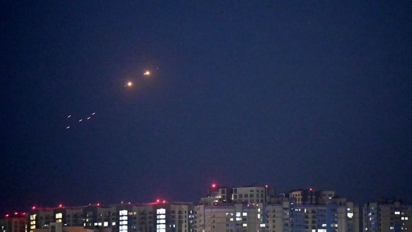Ukrainian air defences deploy against Russian drones during a drone strike in Kyiv on July 18, 2025, amid the Russian invasion in Ukraine.