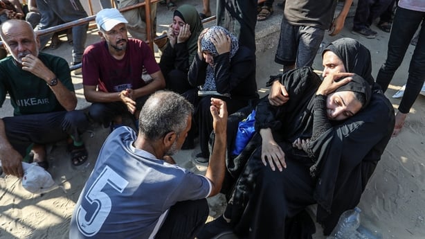 KHAN YUNIS, GAZA - JULY 19: Palestinians mourn for their relatives those who were killed in Israeli airstrike targeted civilians waiting for aid at a U.S. aid distribution point in the western part of Rafah, at Nasser Hospital in Khan Yunis, Gaza on July 19, 2025. (Photo by Abed Rahim Khatib/Anadolu