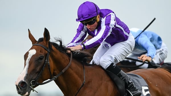Minnie Hauk, with Ryan Moore up, on their way to winning the 2025 Juddmonte Irish Oaks