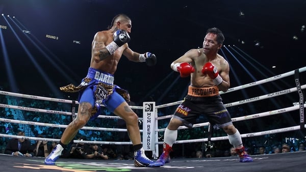 Mario Barrios (L) and Manny Pacquiao during their WBC welterweight title fight ending in a majority draw - July 2025