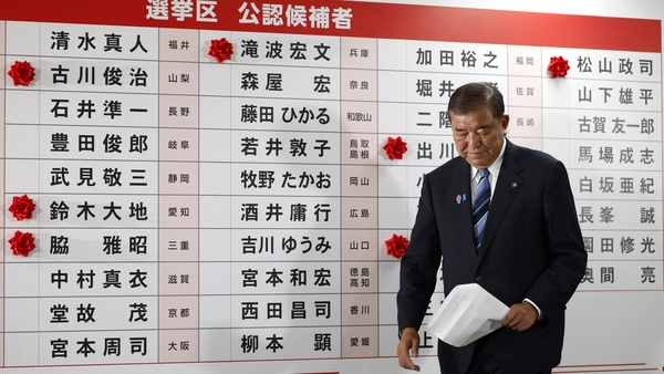 Shigeru Ishiba, Japan's Prime Minister is seen in front of a board with few red paper roses showing elected candidate at his party's headquarters in Tokyo, Japan, 20 July 2025