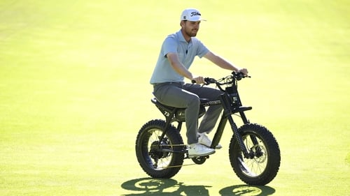 Ryan Gerard rides an e-bike awarded to him after winning the Barracuda Championship