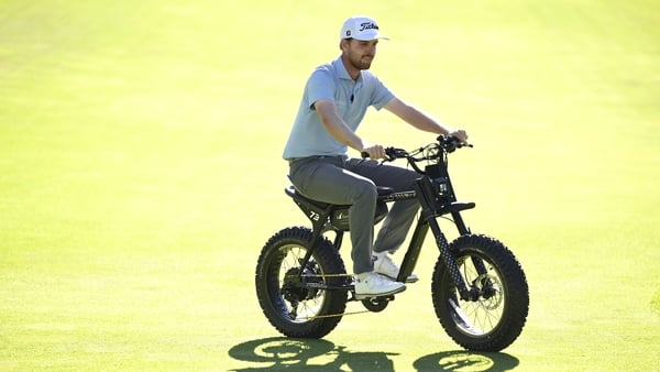 Ryan Gerard rides an e-bike awarded to him after winning the Barracuda Championship