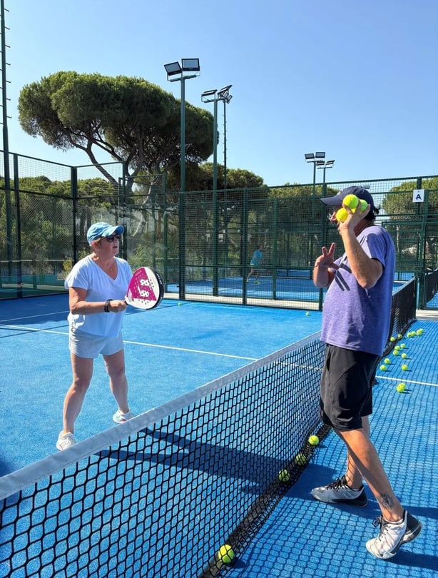 Hannah picks up padel tips from coach Labisa Palmera (Hannah Stephenson/PA)