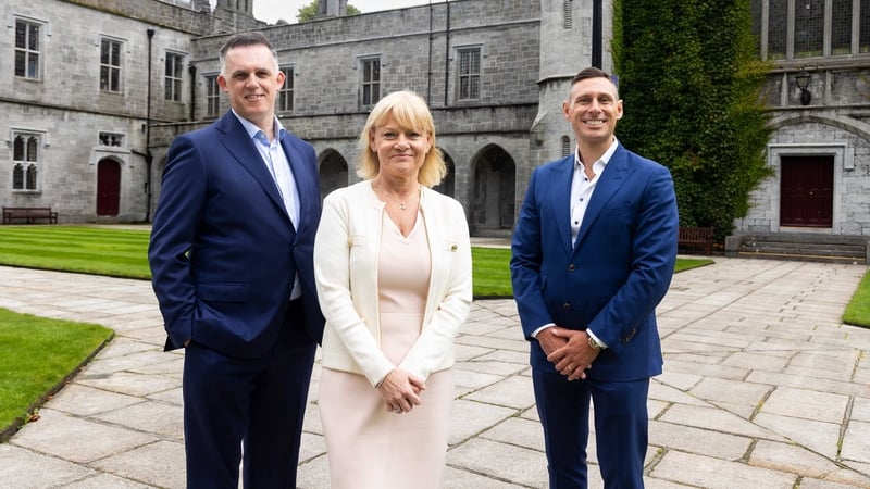 Dermot Callanan from FCC; Sandra Clarke, Xeinadin Ireland Managing Partner and Jonathan Colohan from FCC outside a grey building in Galway