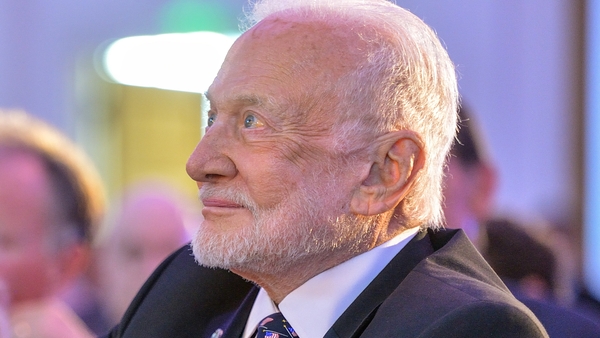 Buzz Aldrin watches a video of the Moon landing during dinner commemorating the 50th anniversary of Apollo 11's return to Earth at the Richard Nixon Presidential Library and Museum in Yorba Linda, California on Tuesday, July 23, 2019