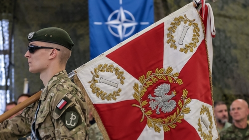 A Polish soldier marching during a military ceremony last week. Poland is urging neighbours to prepare themselves for aggression from Russia